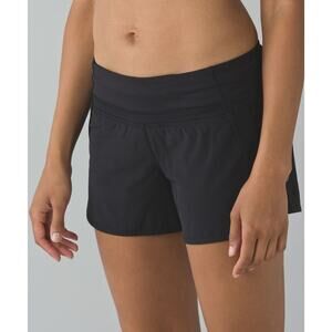 Lululemon Run Times Shorts Womens 4 Black Zip Pocket Drawstring Lined Logo